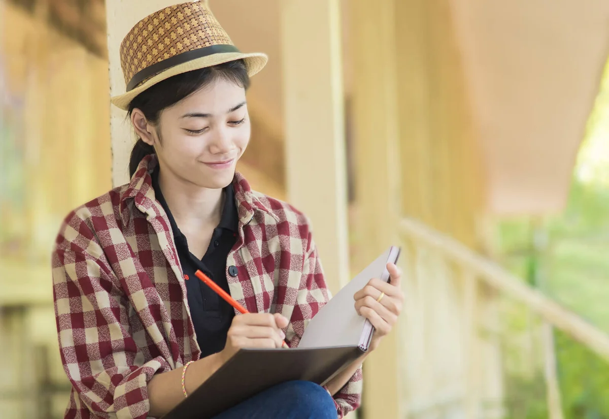 High School Girl Writing Poem