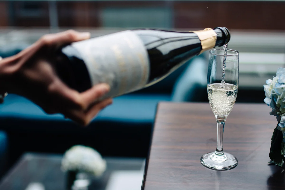 Pouring sparkling wine