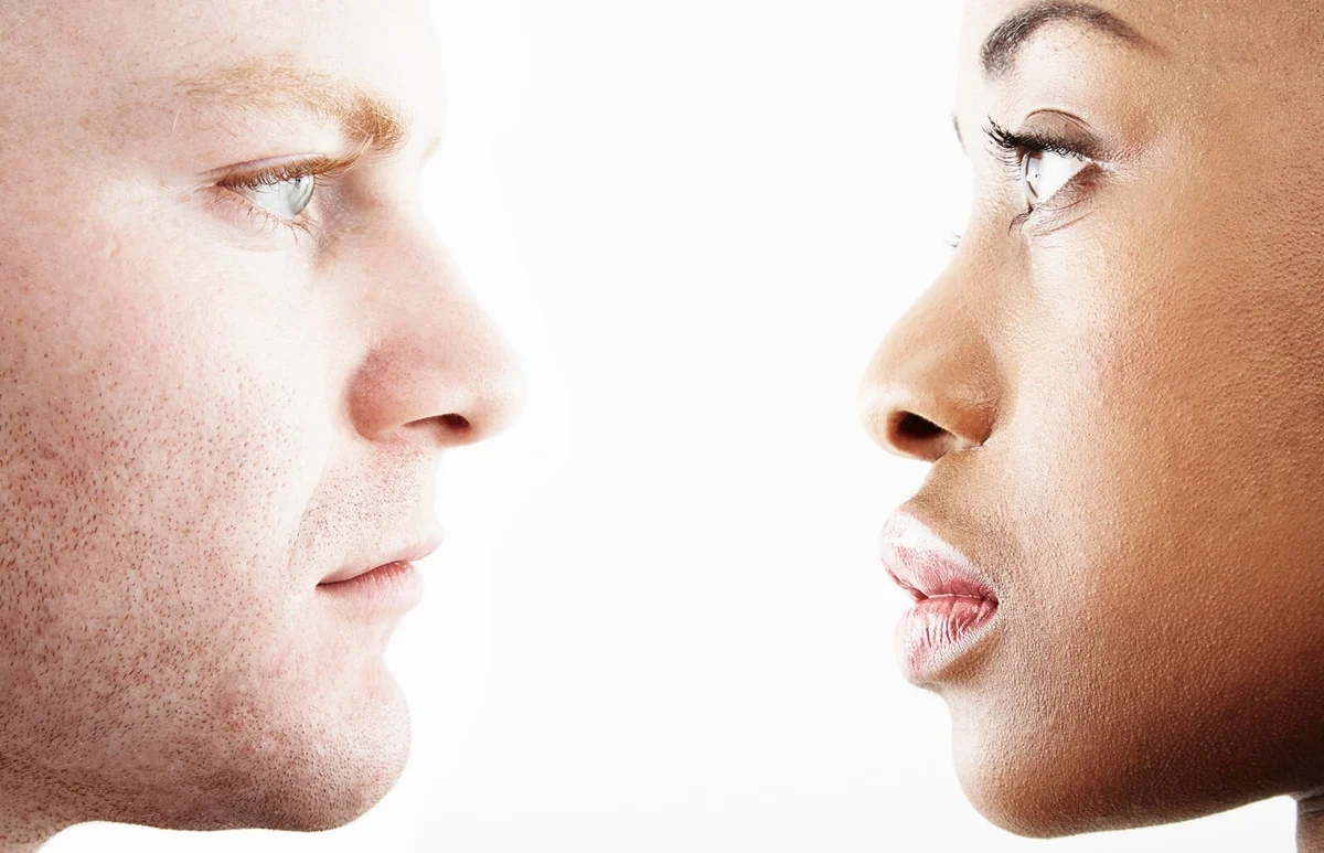young couple face to face in profile