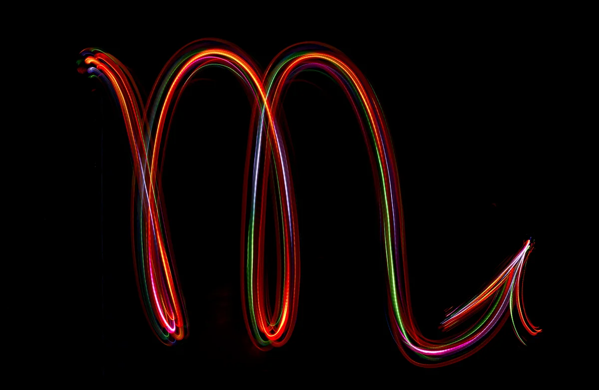 Scorpio sign from led light on black background