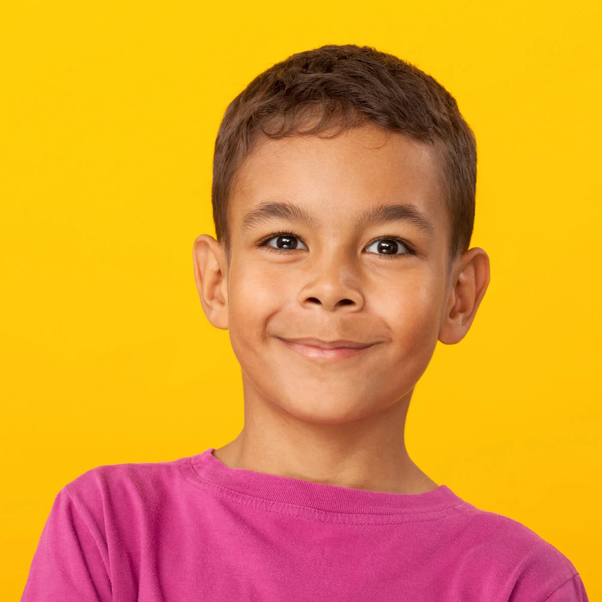 studio portrait of a 10 year old schoolboy