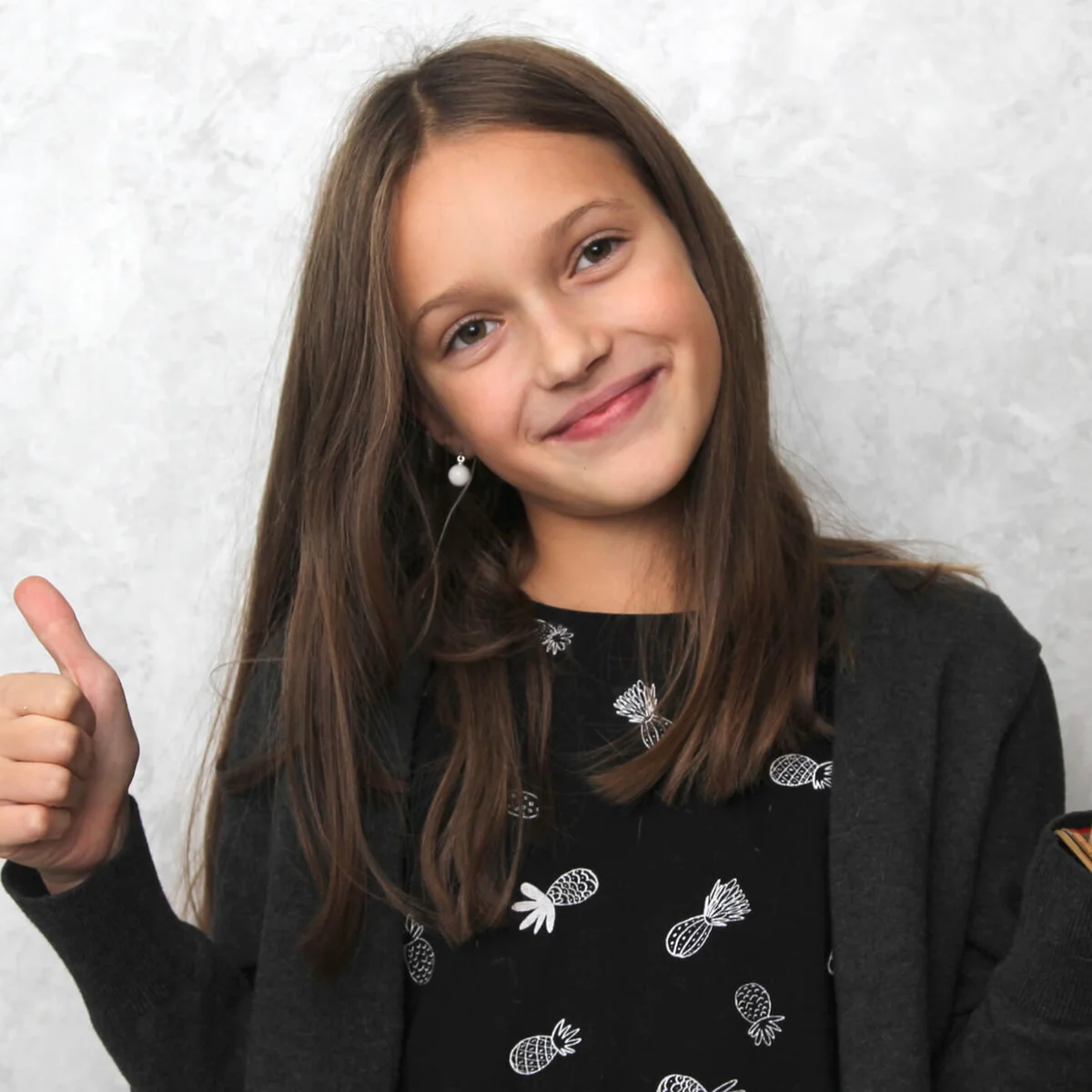 Portrait Of Smiling Girl Gesturing