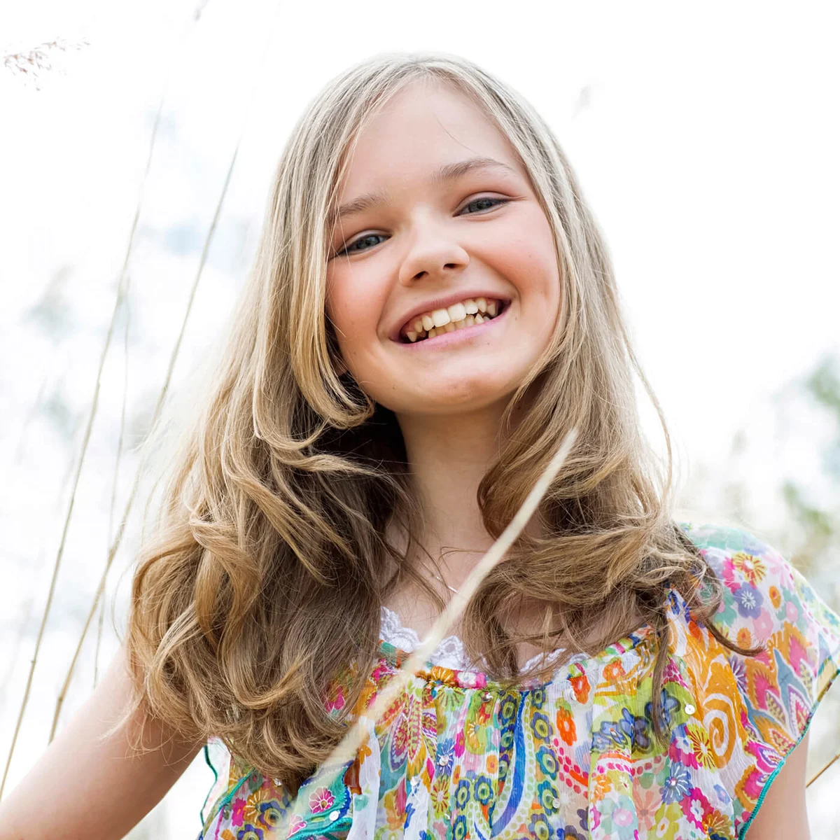 Portrait of smiling girl wearing summer dress