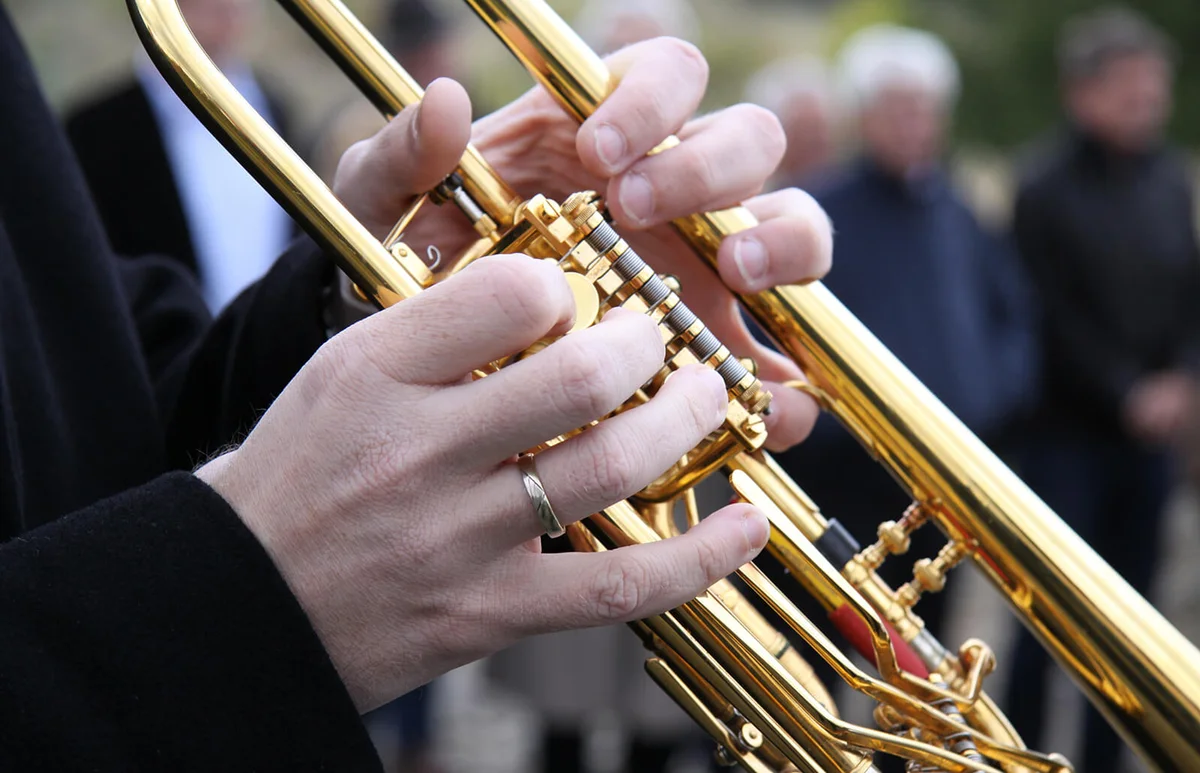 Trumpet player at funeral