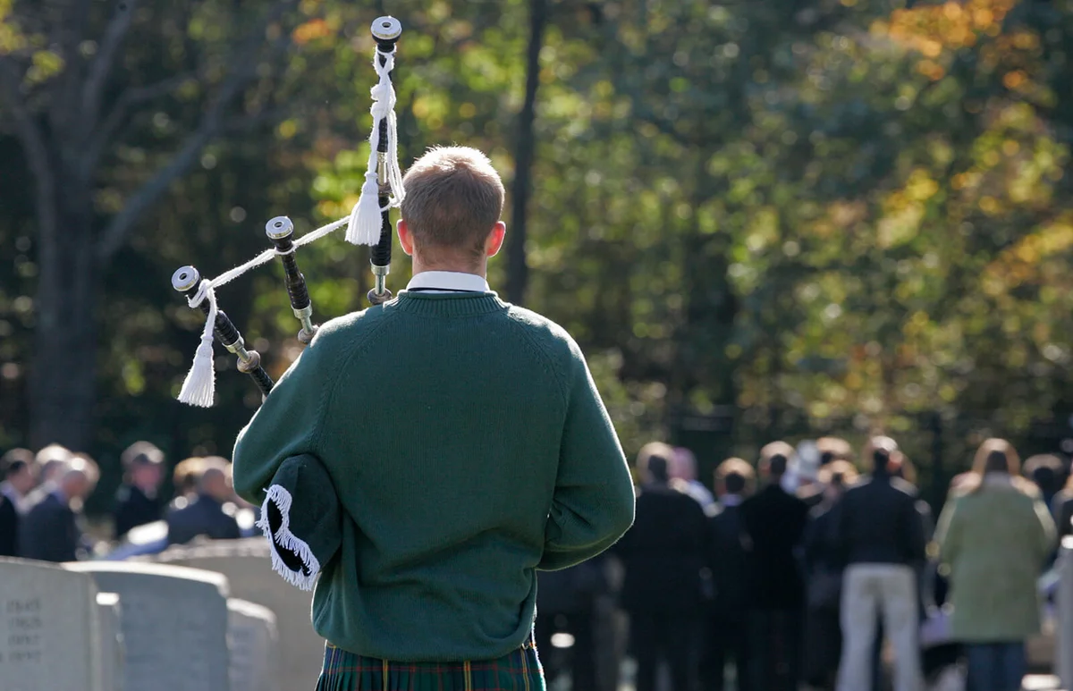 Bag Pipe Player at Funeral
