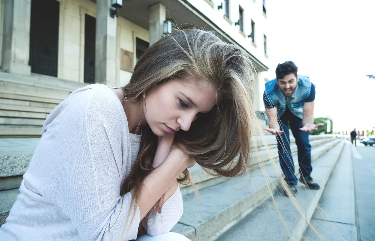 angry man shouting at his girlfriend