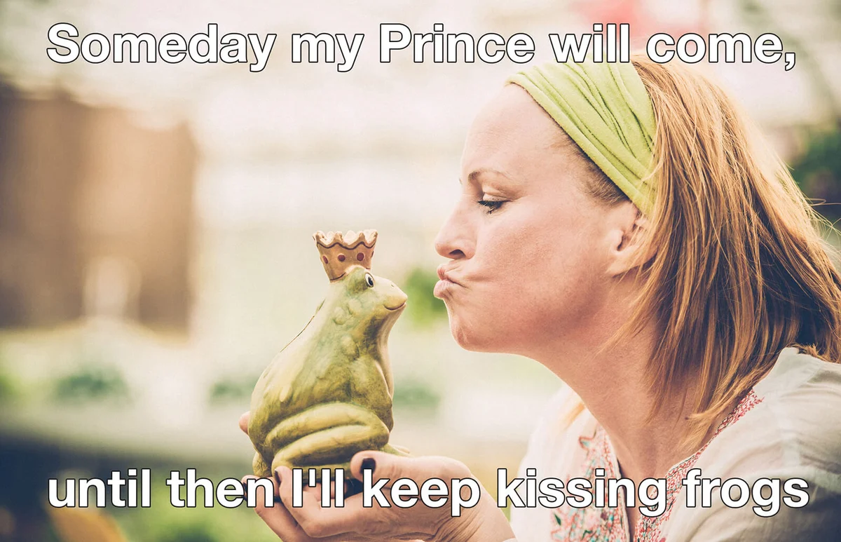 Woman kissing a frog