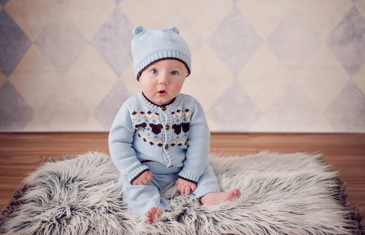 Baby boy in a teddy bear sweater outfit