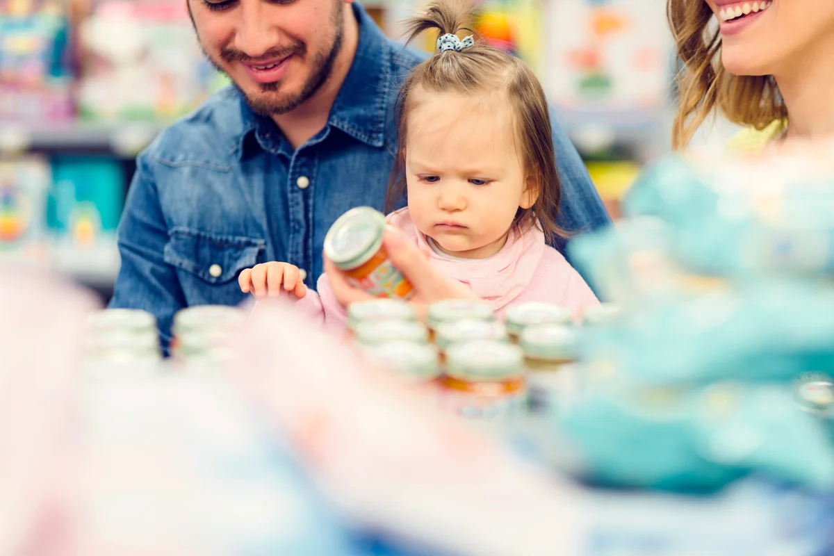 Family Groceries Shopping In Local Supermarket