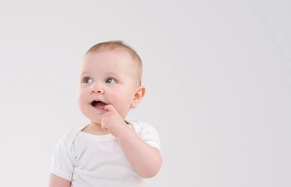 Baby with finger in mouth