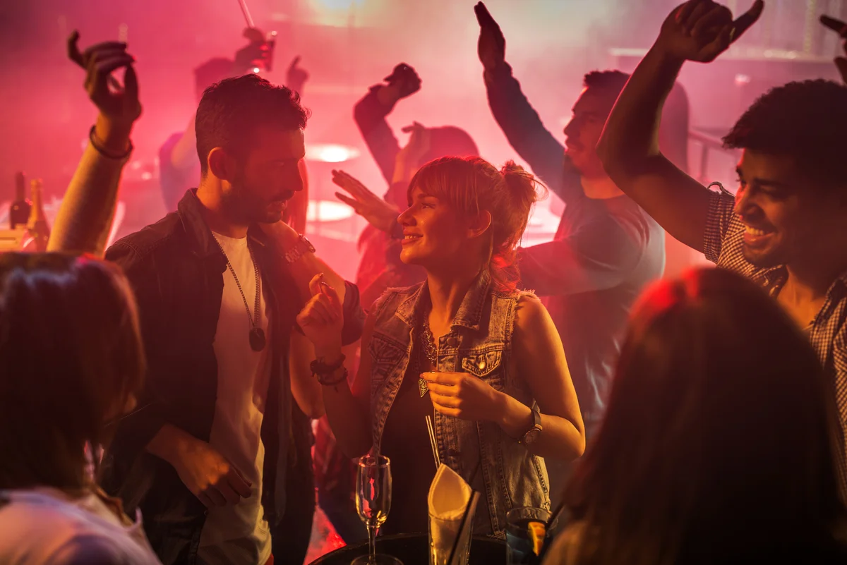 Couple on date and dancing at nightclub