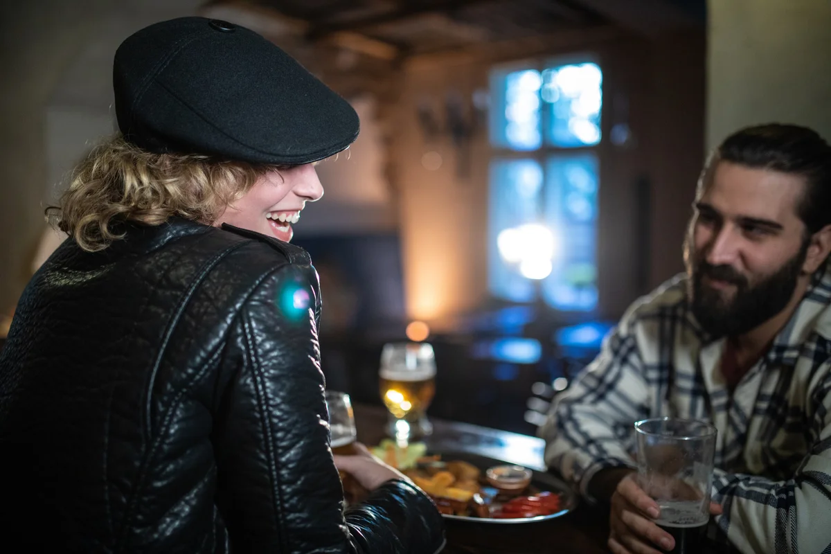 Couple on a date at a pub