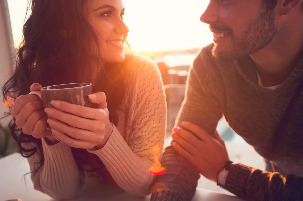 Couple drinking coffee and talking