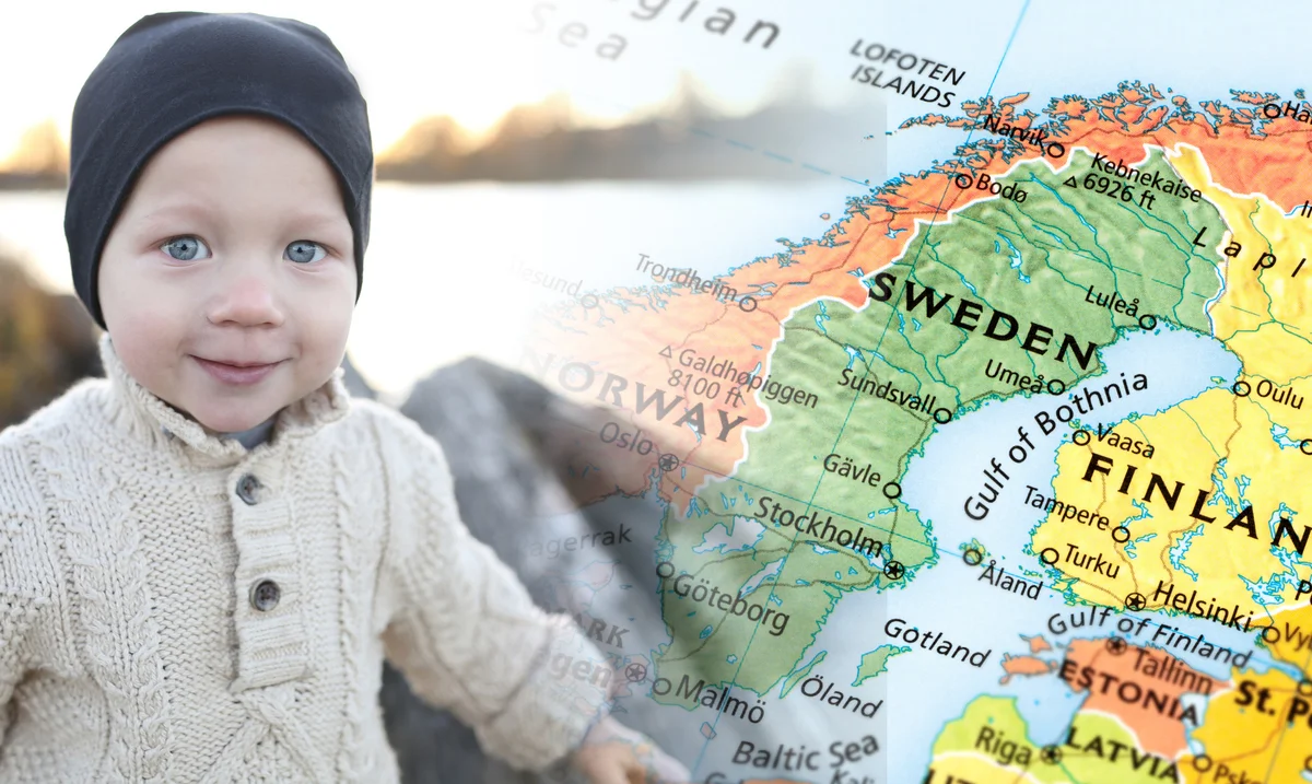 Smiling Swedish boy at lake