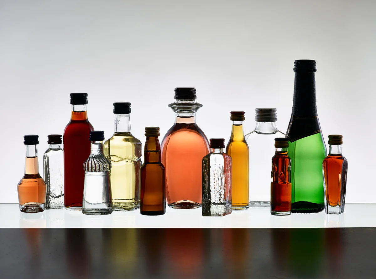Unlabeled liquor bottles