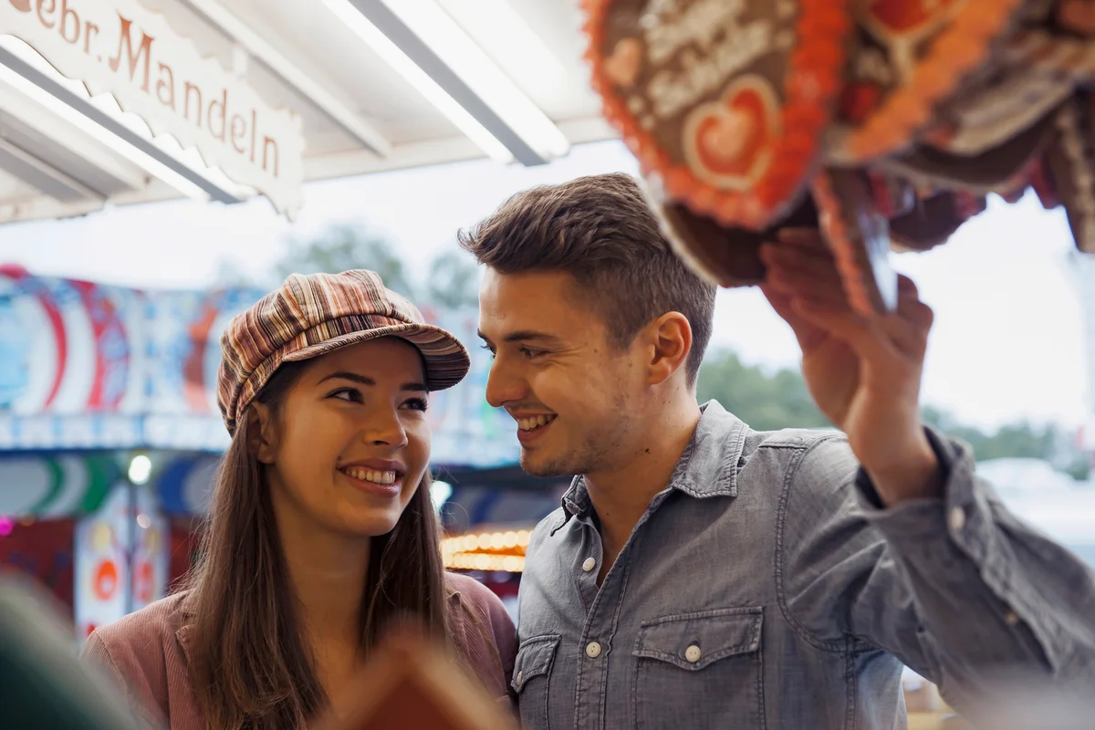 Couple on a date at an amusement park