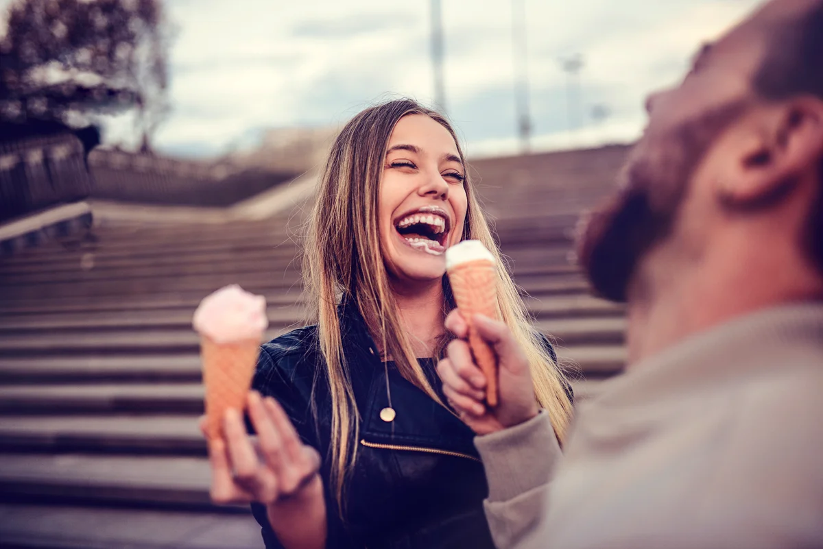 Girl Eating Ice Cream With Boyfriend