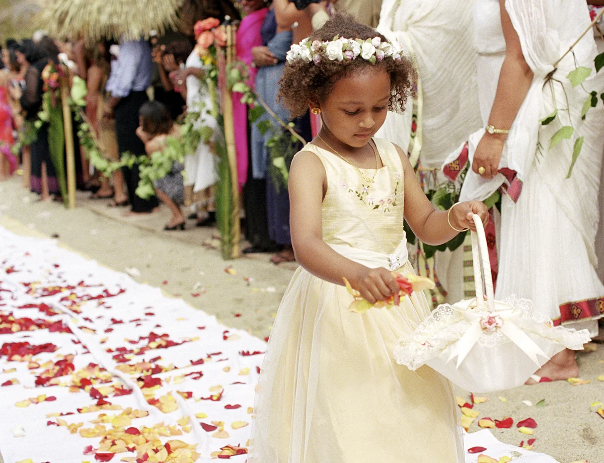 Flower girl in aisle