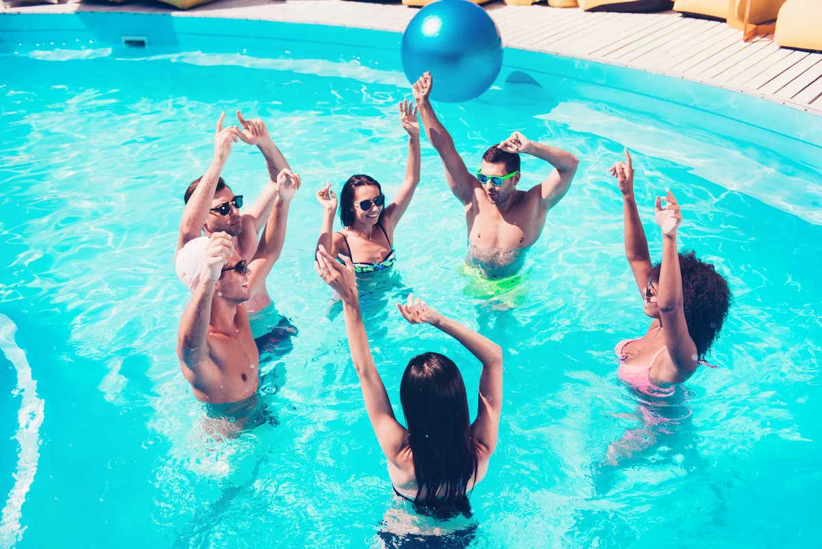 Friends hanging out in the pool
