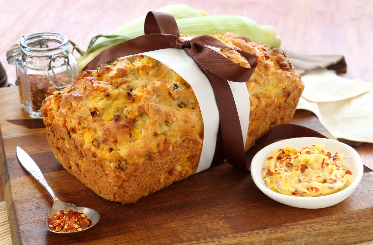 Fresh baked corn bread with chillii butter and dried chillies