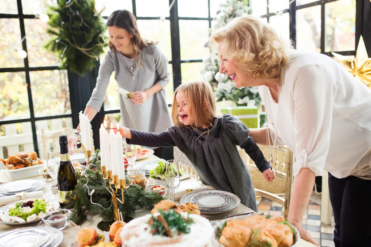 Lighting candles for Women's Little Christmas