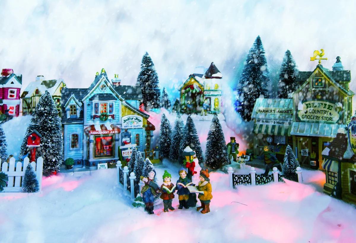 Christmas background of winter miniature scenery with kids