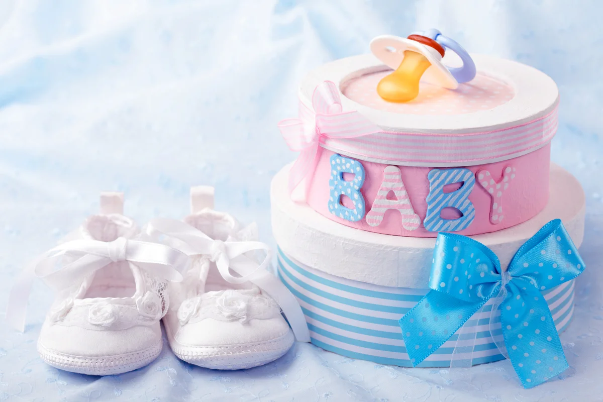 Little baby booties and gift boxes
