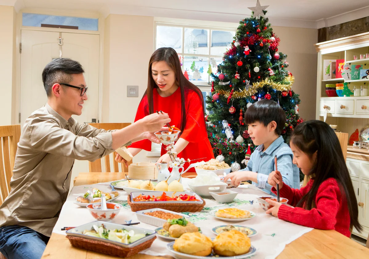 Chinese family enjoying their christmas dinner
