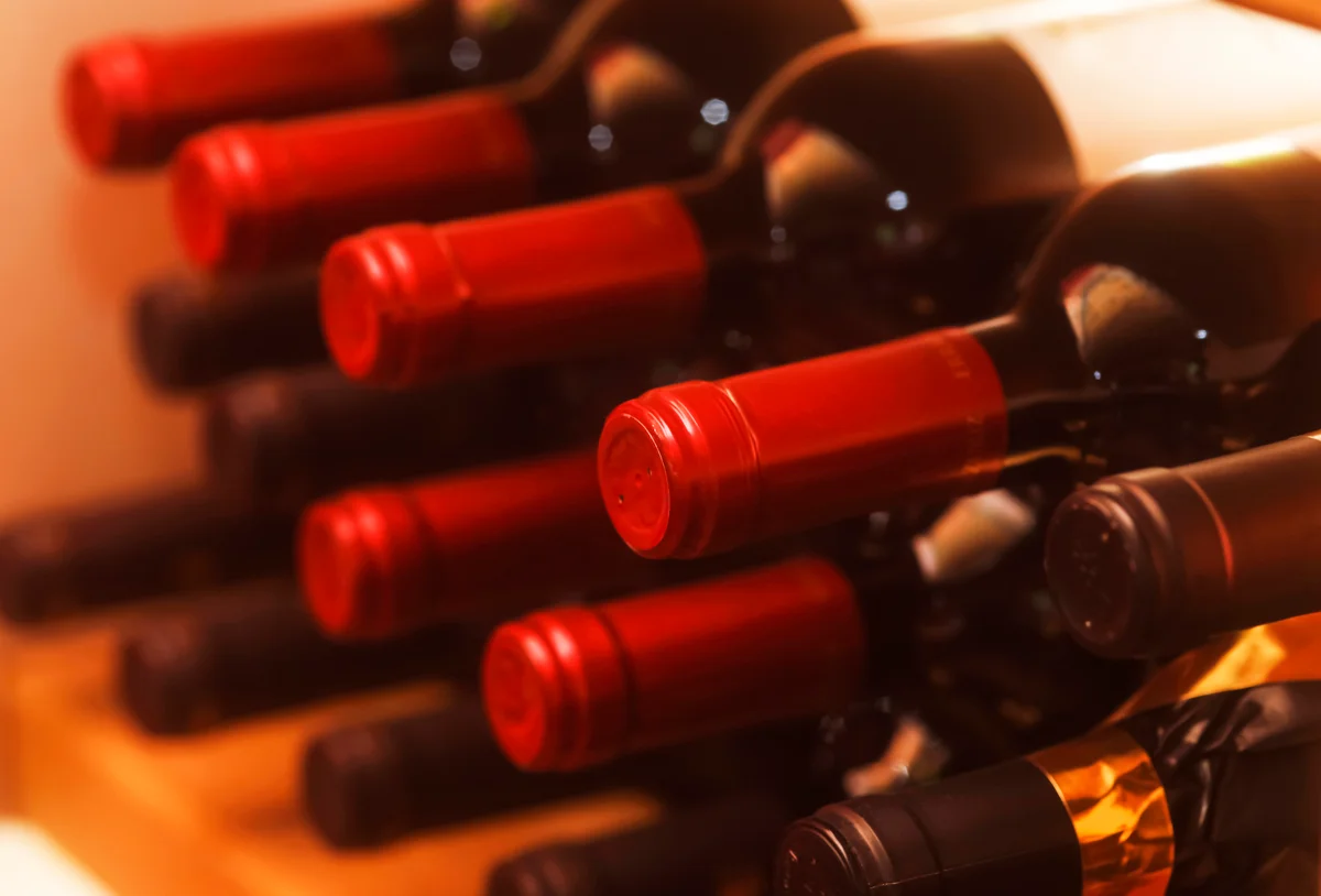 Red wine stored on a shelf