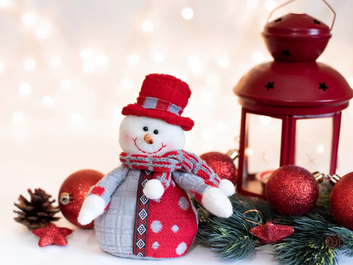 Snowman with a lantern
