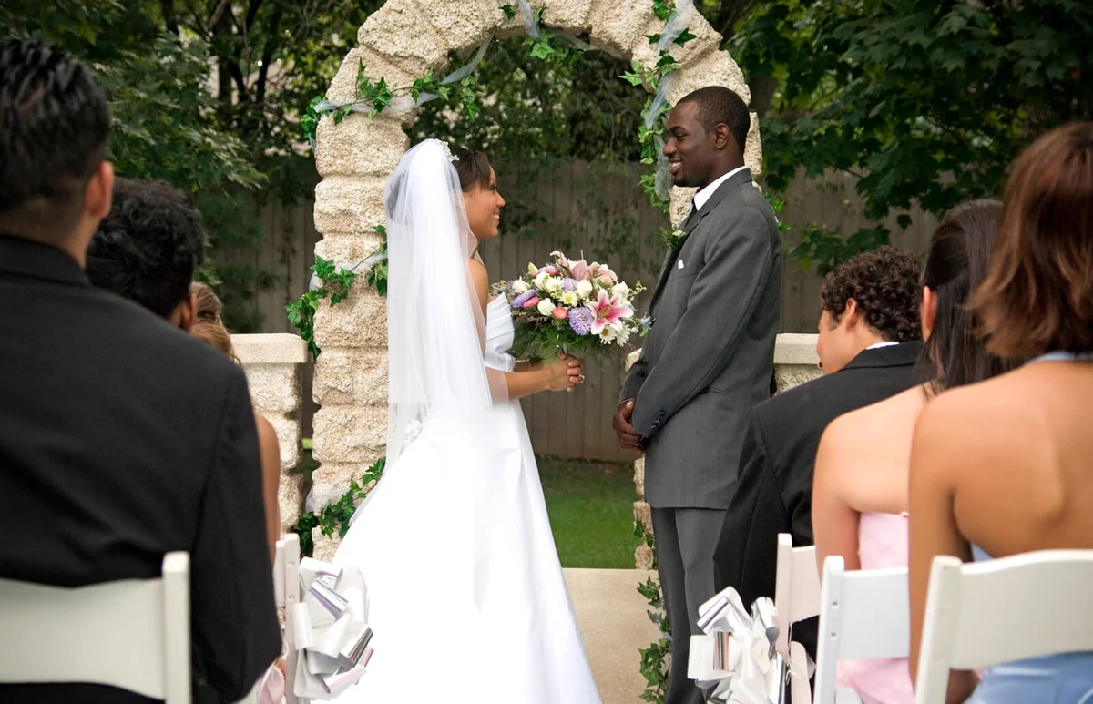 Bride and groom at altar and staring at each other