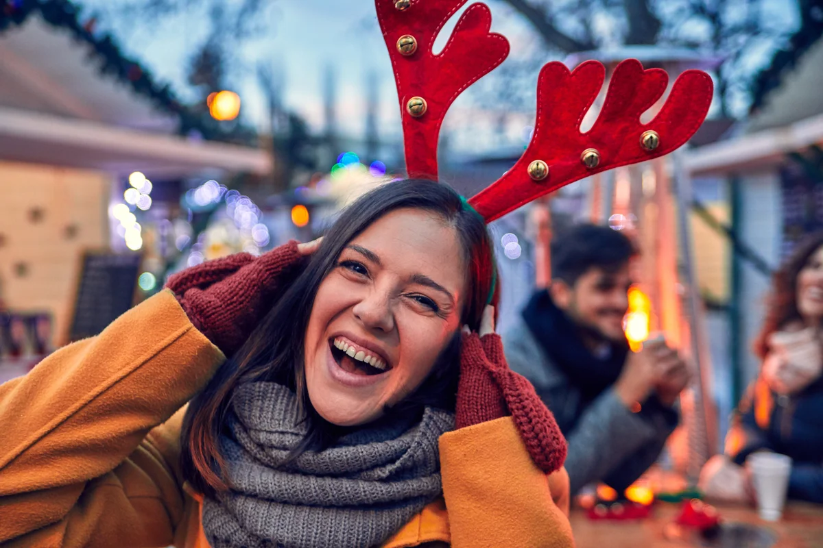 Woman wearing Reindeer antlers On Her Head