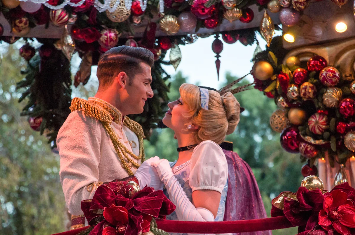 Prince Charming and Cinderella on parade float
