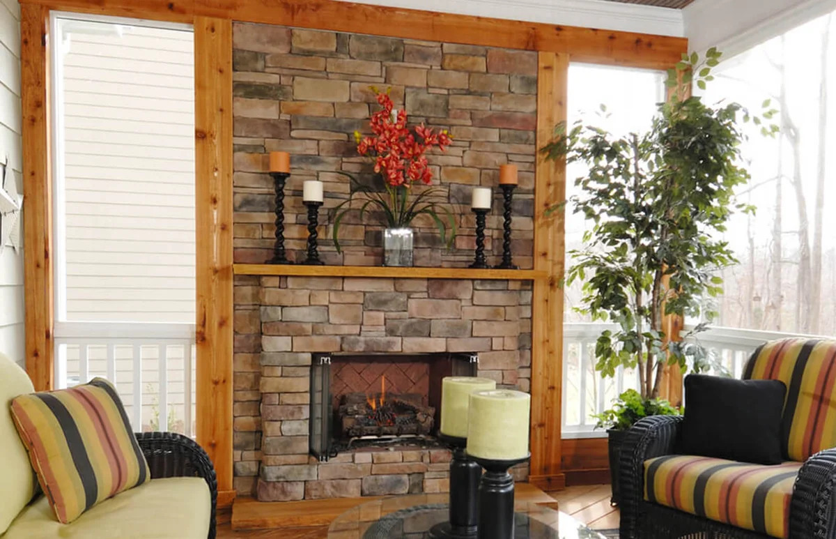 Rear screened-in patio with fireplace