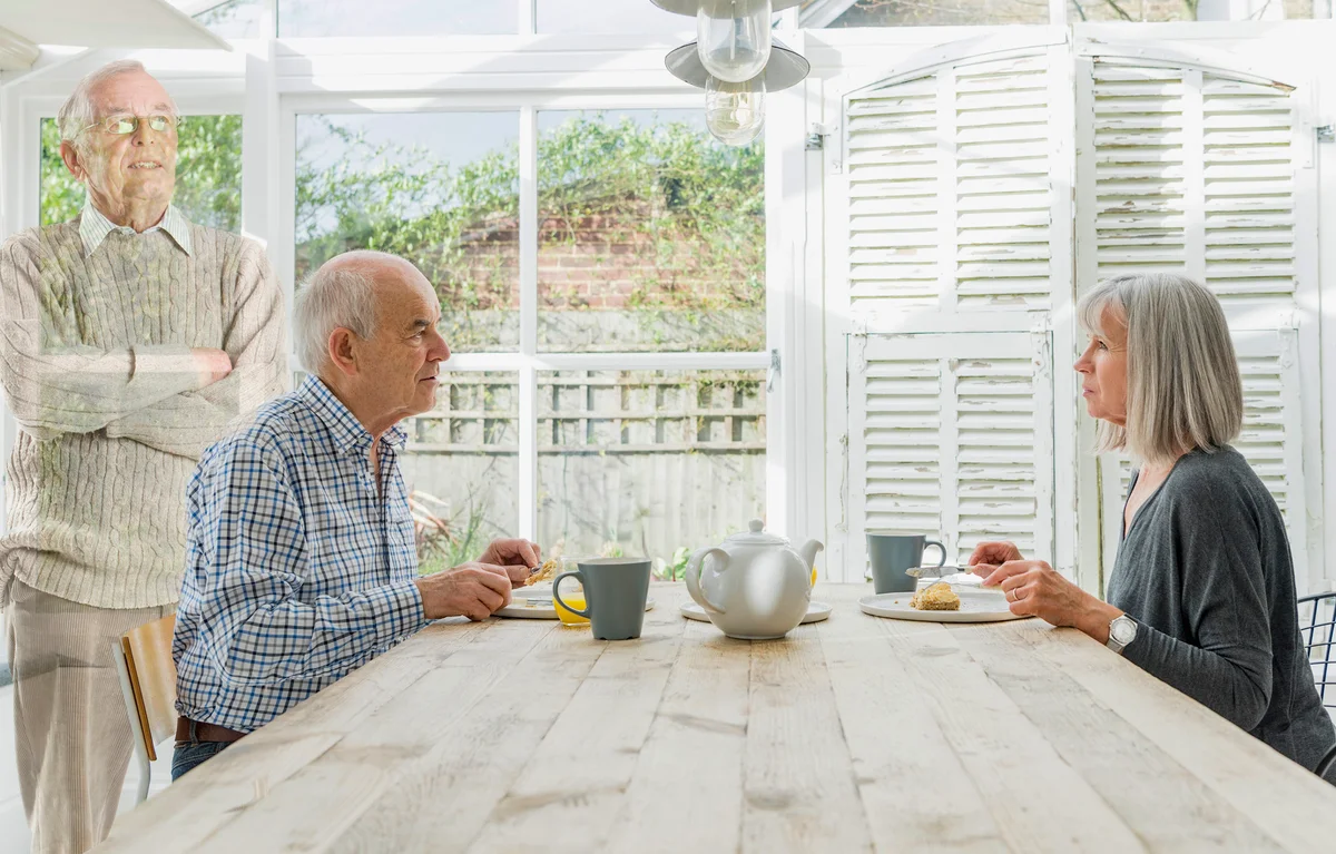 Senior couple eating breakfast