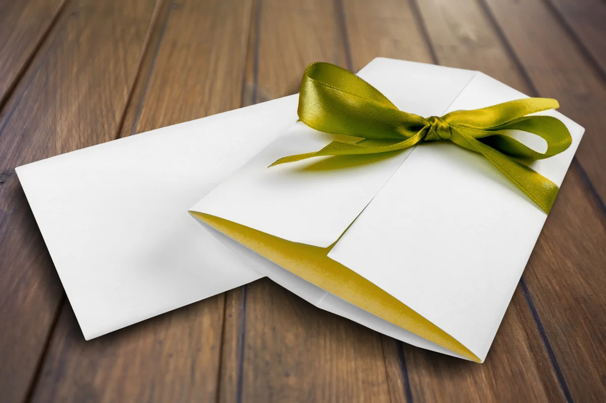 Thank you letter wrapped in ribbon