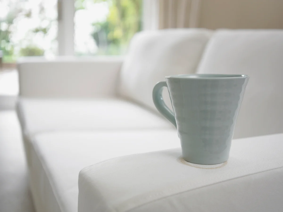 coffee cup on sofa