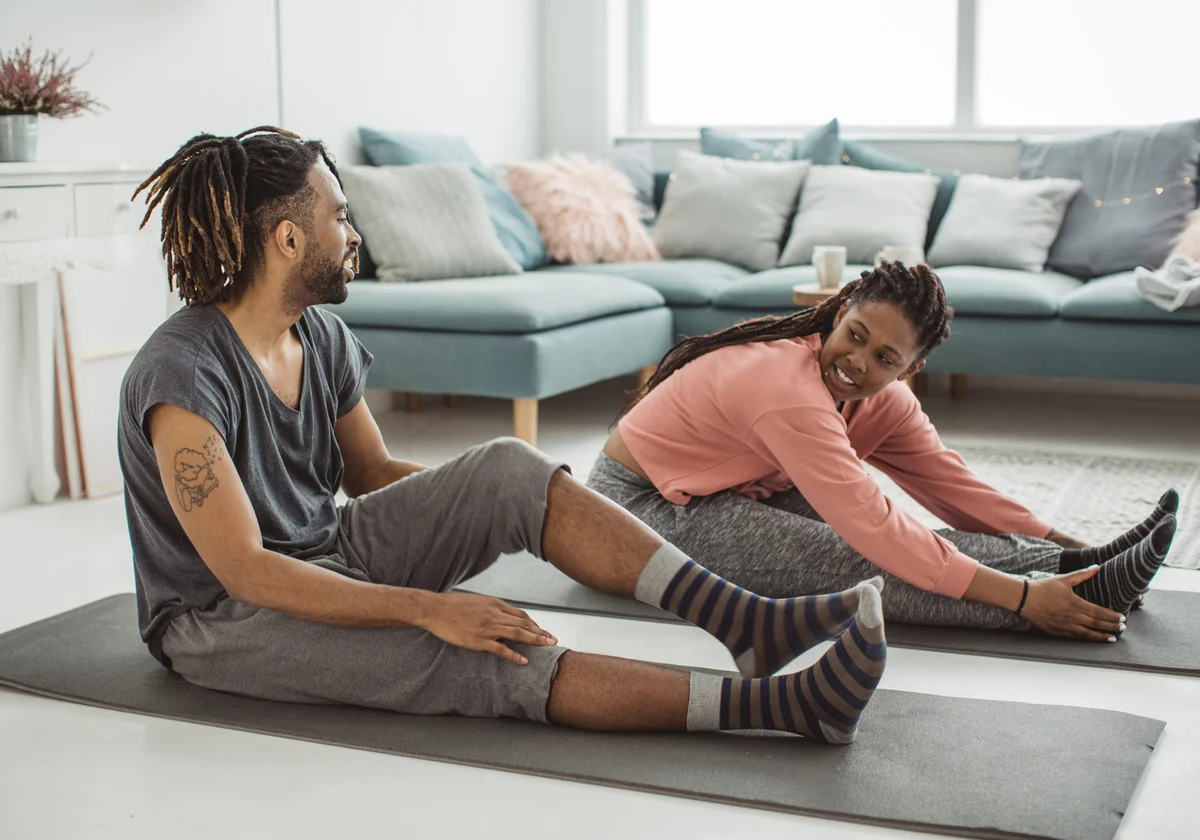 Couple doing yoga