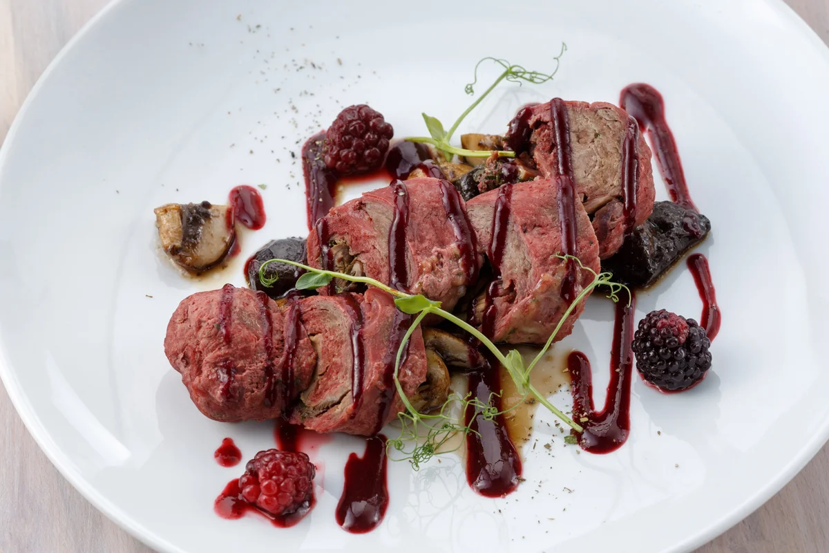 Steak with blackberry thyme sauce