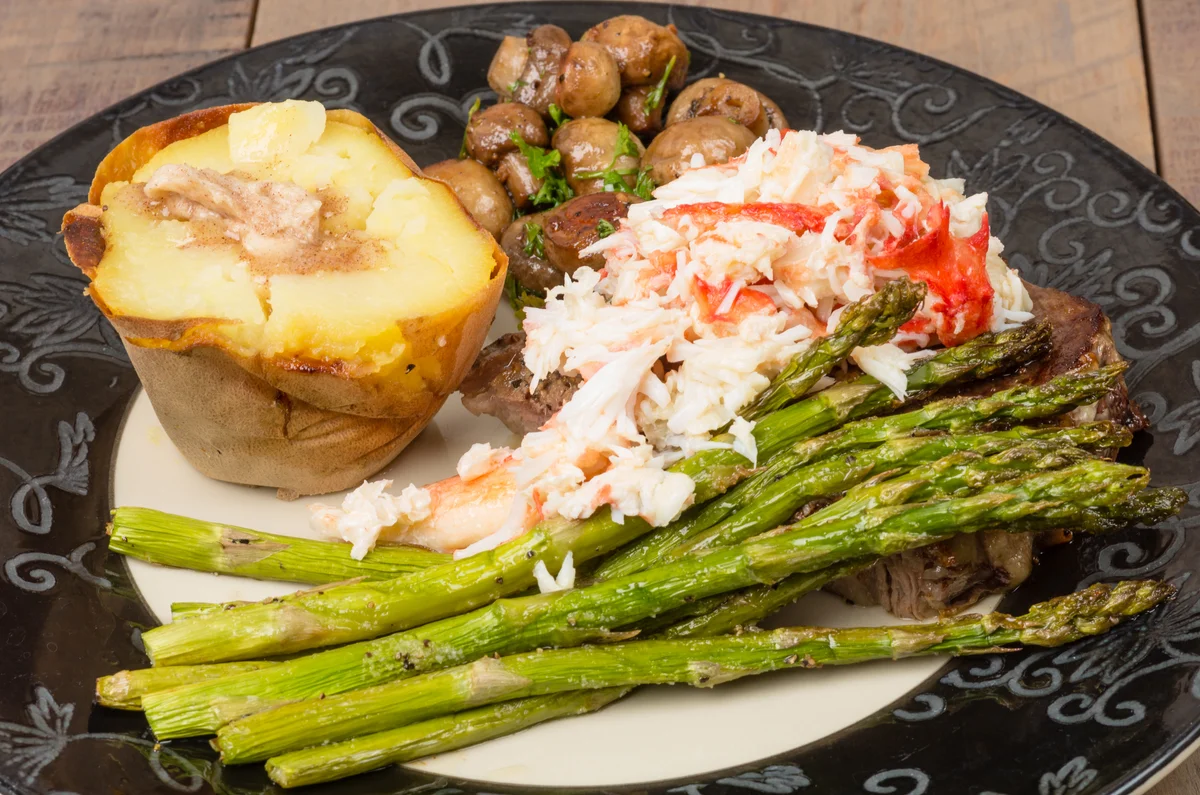 Steak with butter poached crab