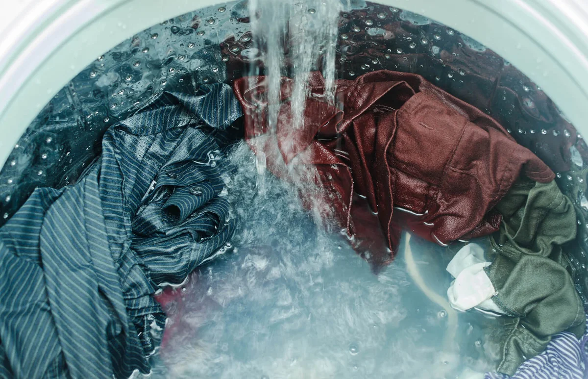 High Angle View Of Clothes Being Washed In Washing Machine