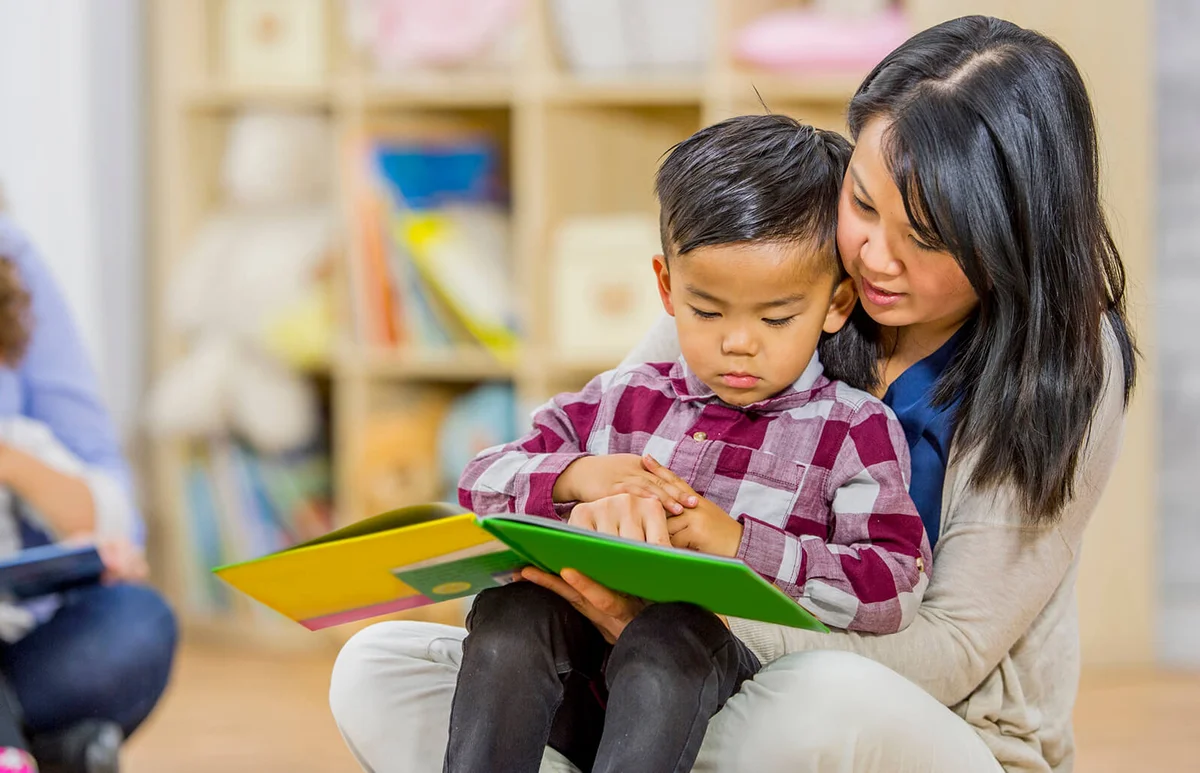 Mother Reading to Her Son