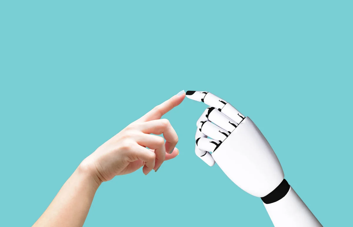 Cropped Hand Touching Robot