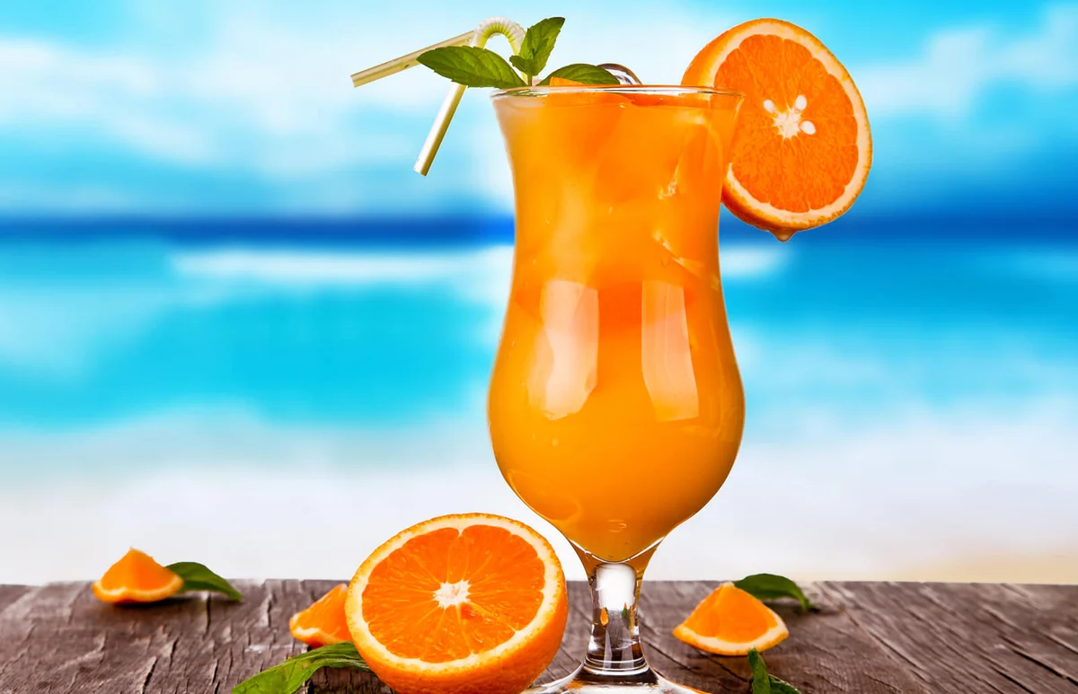 Summer drinks with blur beach