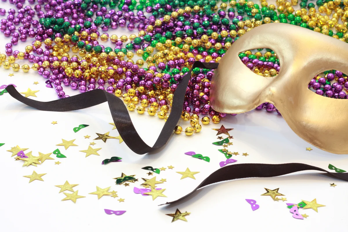 Gold Carnival mask with beads in Mardi Gras colors