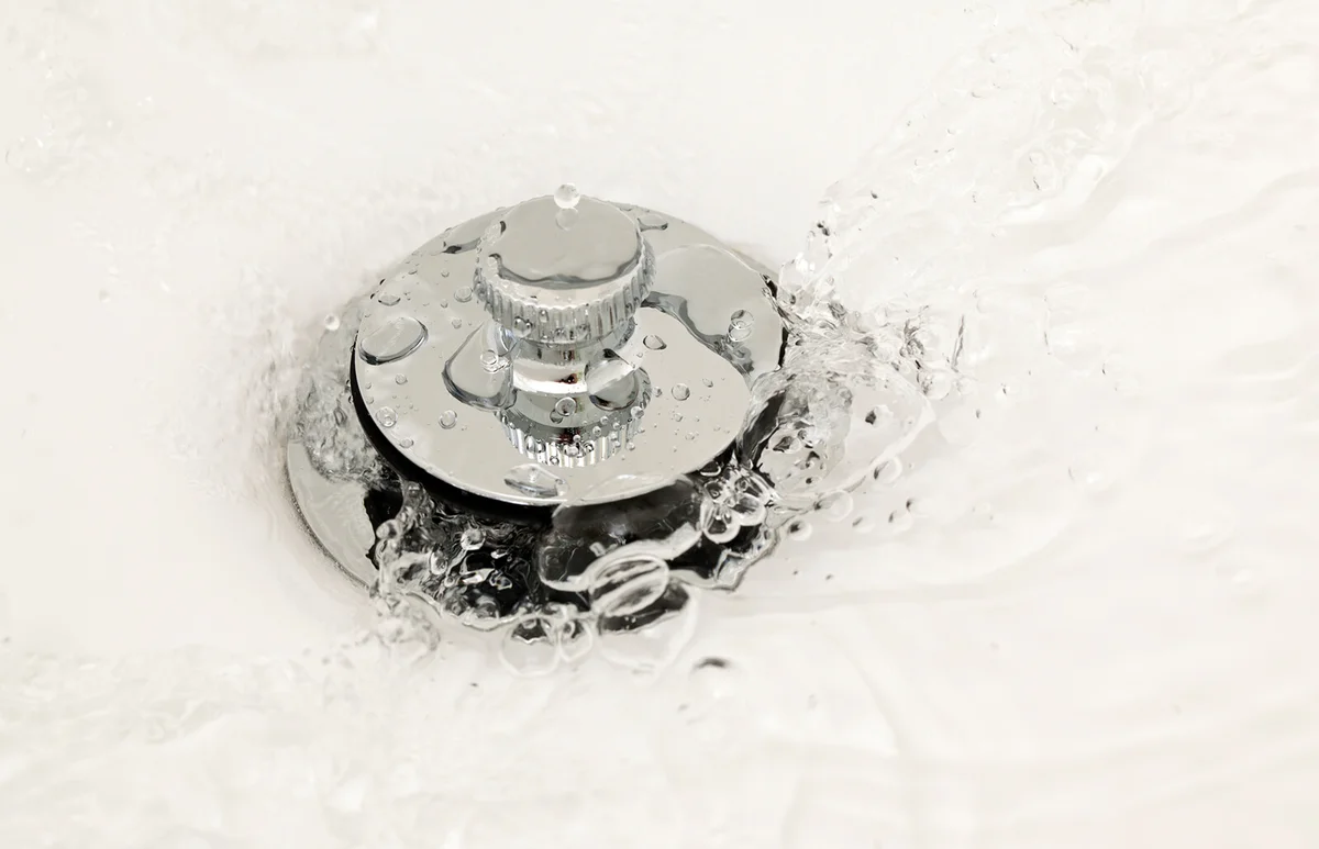 Water running down the drain
