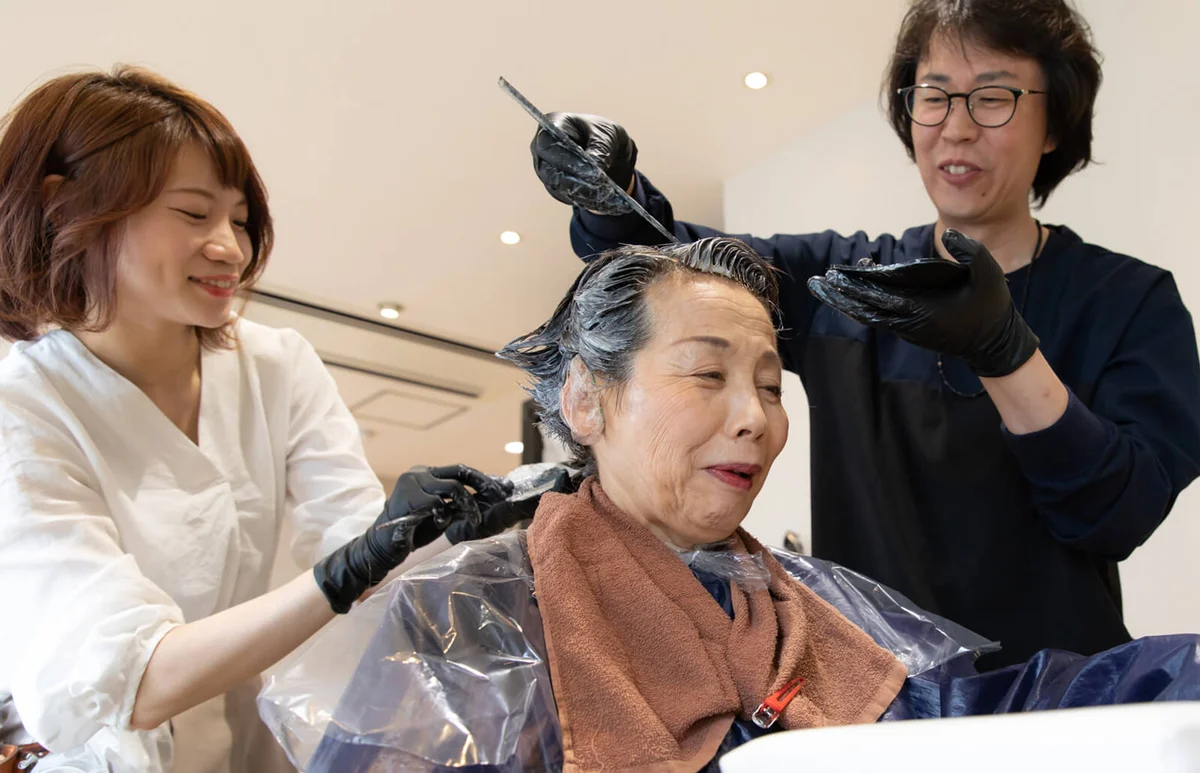 Japanese senior woman having beauty treatment