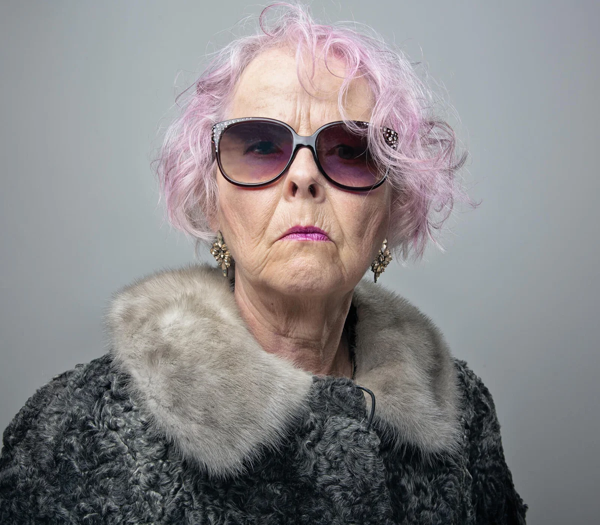 eccentric senior lady with cool attitude portrait