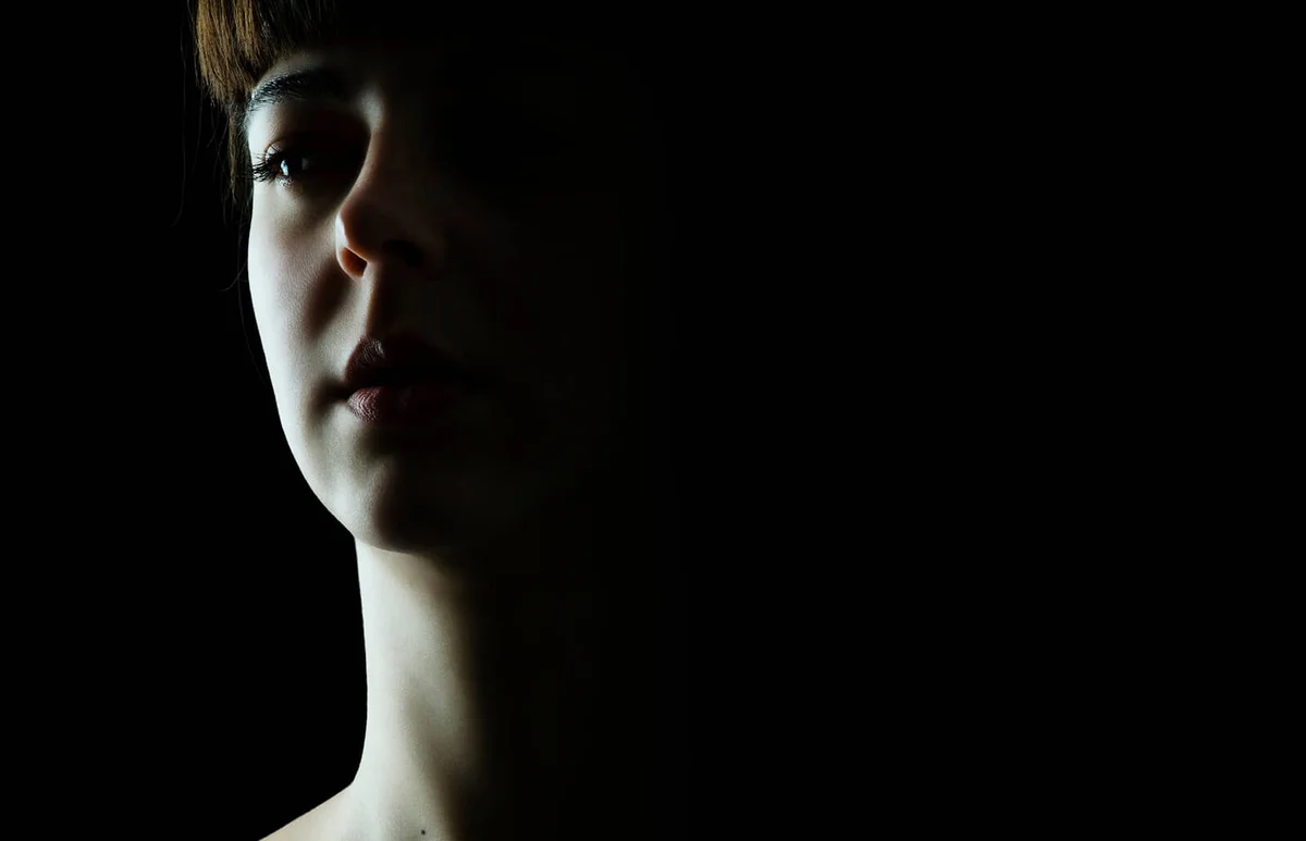 A depressed looking young woman