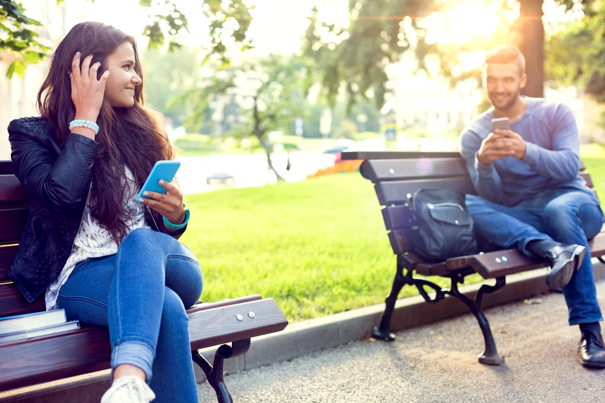 Flirting couple in the park